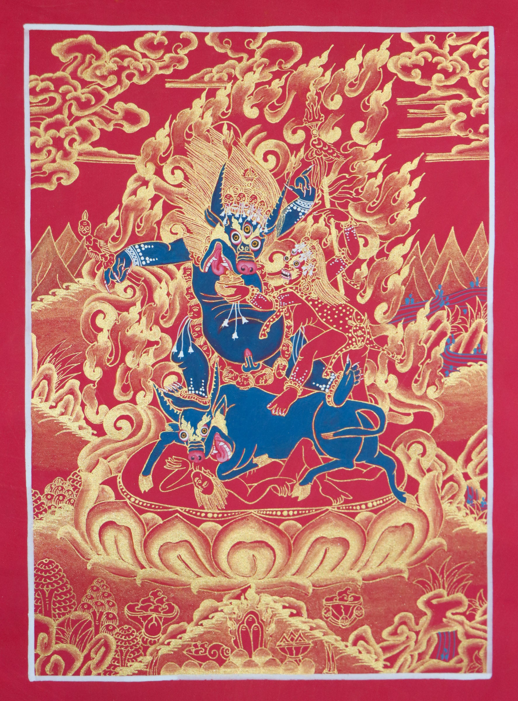 Yamantaka, a wrathful deity in Tibetan Buddhism, represents the destruction of death and ignorance. This genuine Tibetan thangka captures his fierce energy and is a powerful symbol of spiritual transformation.