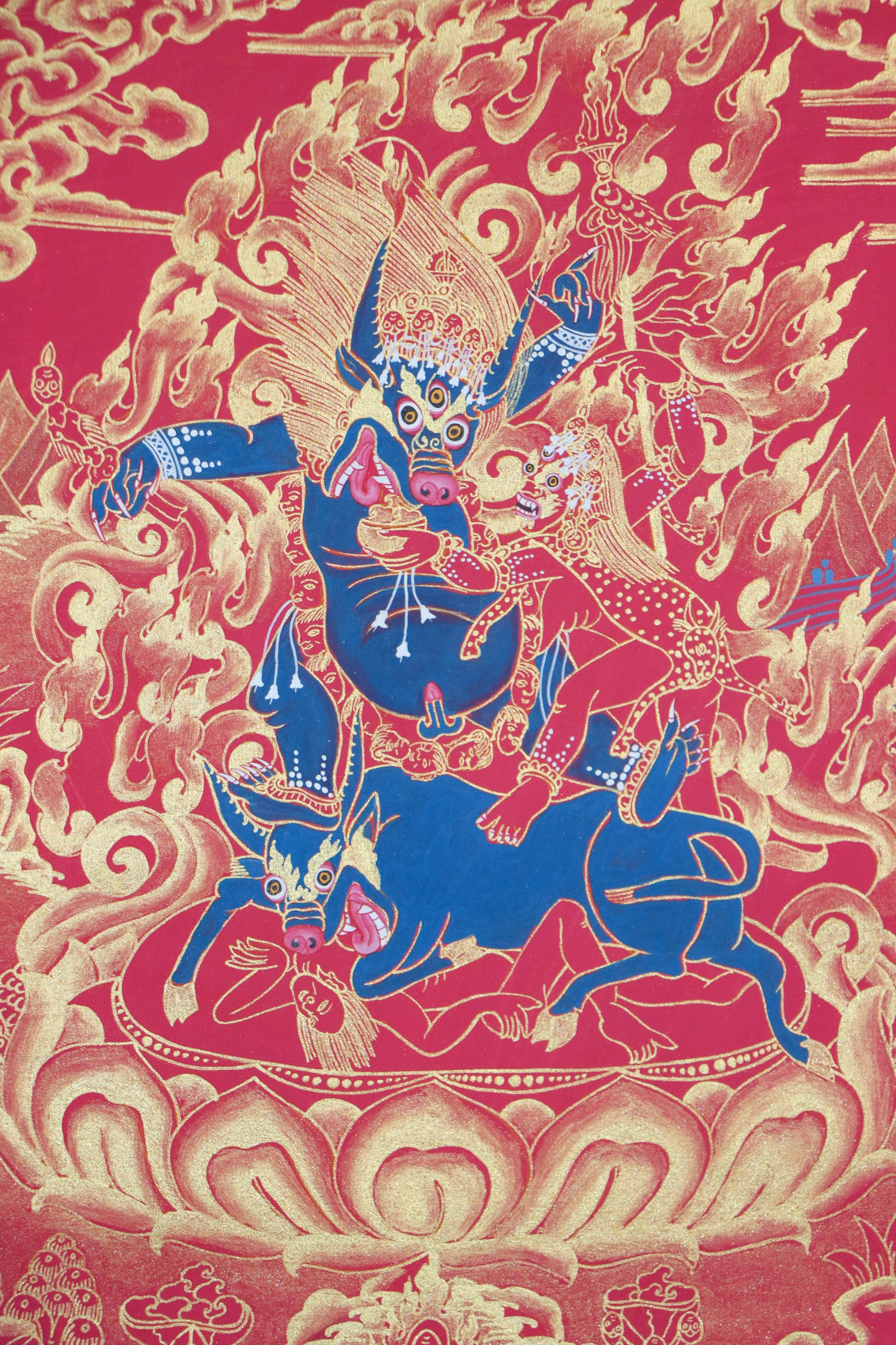 Yamantaka, a wrathful deity in Tibetan Buddhism, represents the destruction of death and ignorance. This genuine Tibetan thangka captures his fierce energy and is a powerful symbol of spiritual transformation.