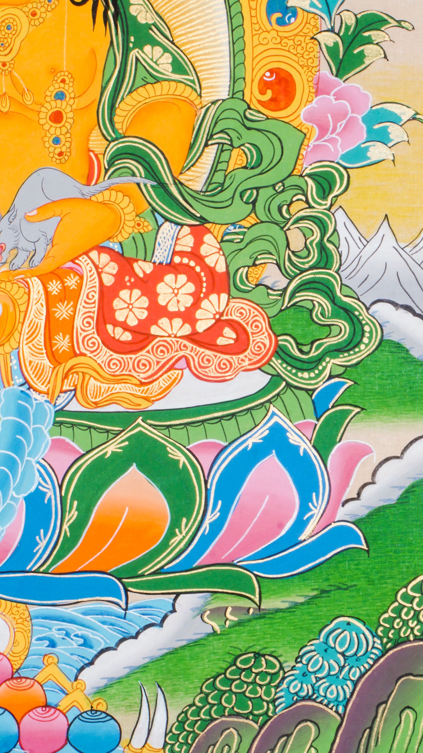 This is a hand-painted Thangka art showcasing wrathful deity Yellow Zambala in Nepal using 24k gold and natural pigments.