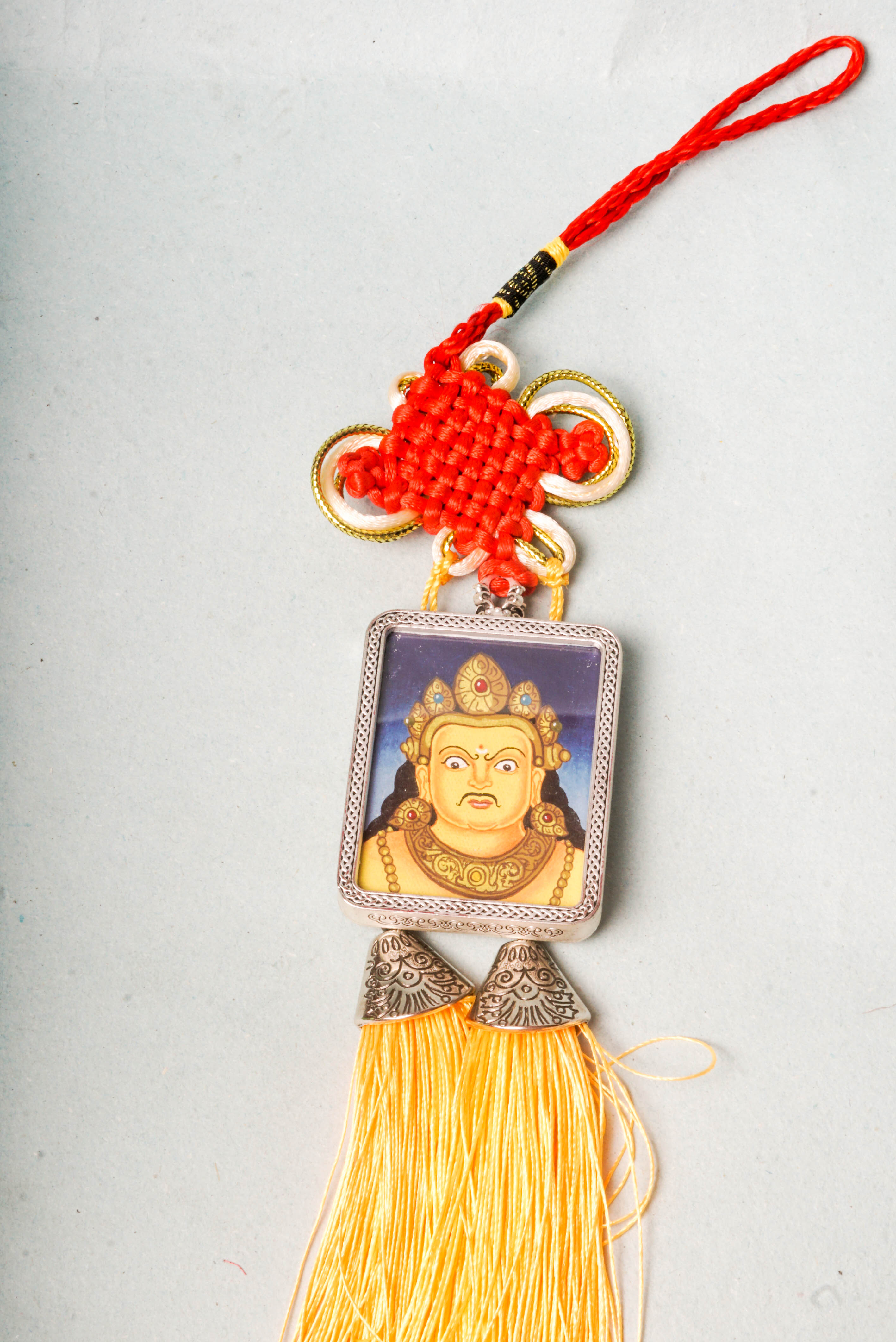 The Zambala Newari Ghau Thangka is a genuine Tibetan Buddhist artwork hand-painted in traditional Newar style, honoring the deity of wealth and prosperity. Rich in detail and symbolism, it embodies Zambala’s blessings of abundance, success, and protection.