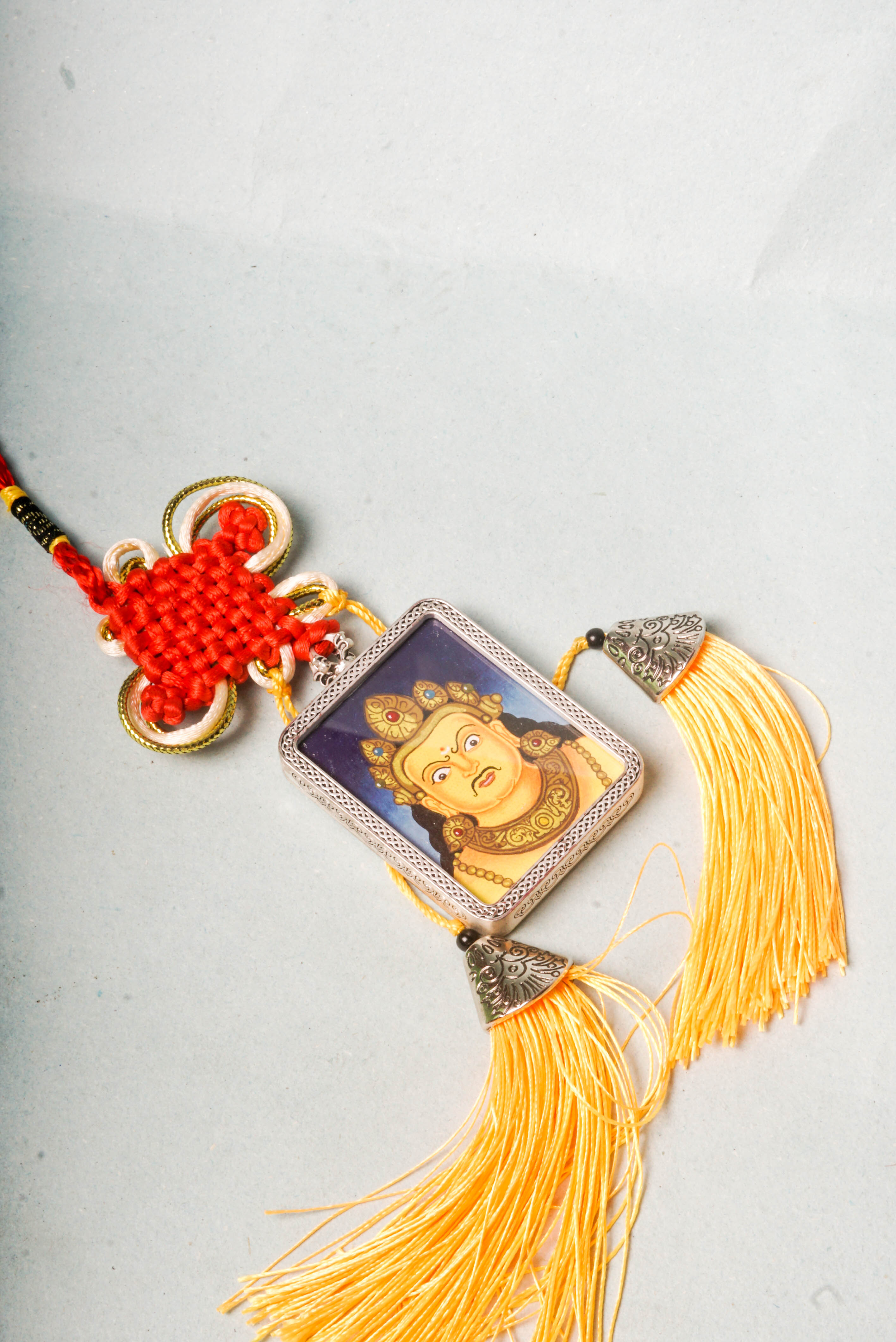 The Zambala Newari Ghau Thangka is a genuine Tibetan Buddhist artwork hand-painted in traditional Newar style, honoring the deity of wealth and prosperity. Rich in detail and symbolism, it embodies Zambala’s blessings of abundance, success, and protection.