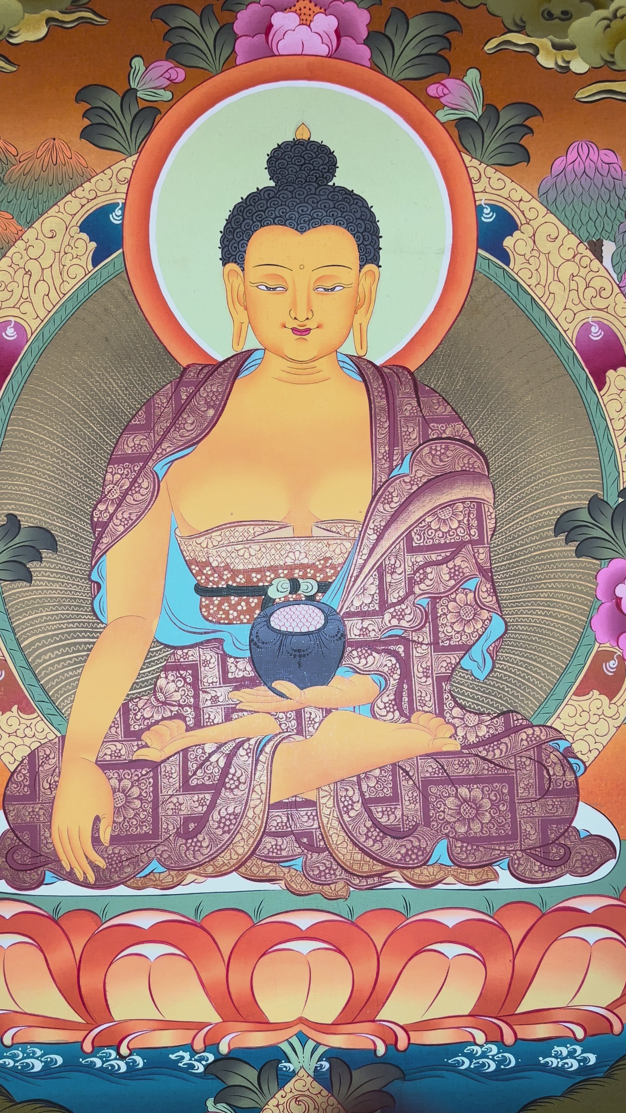Shakyamuni Buddha thangka showing the historical Buddha seated in meditation on a lotus throne holding an alms bowl.