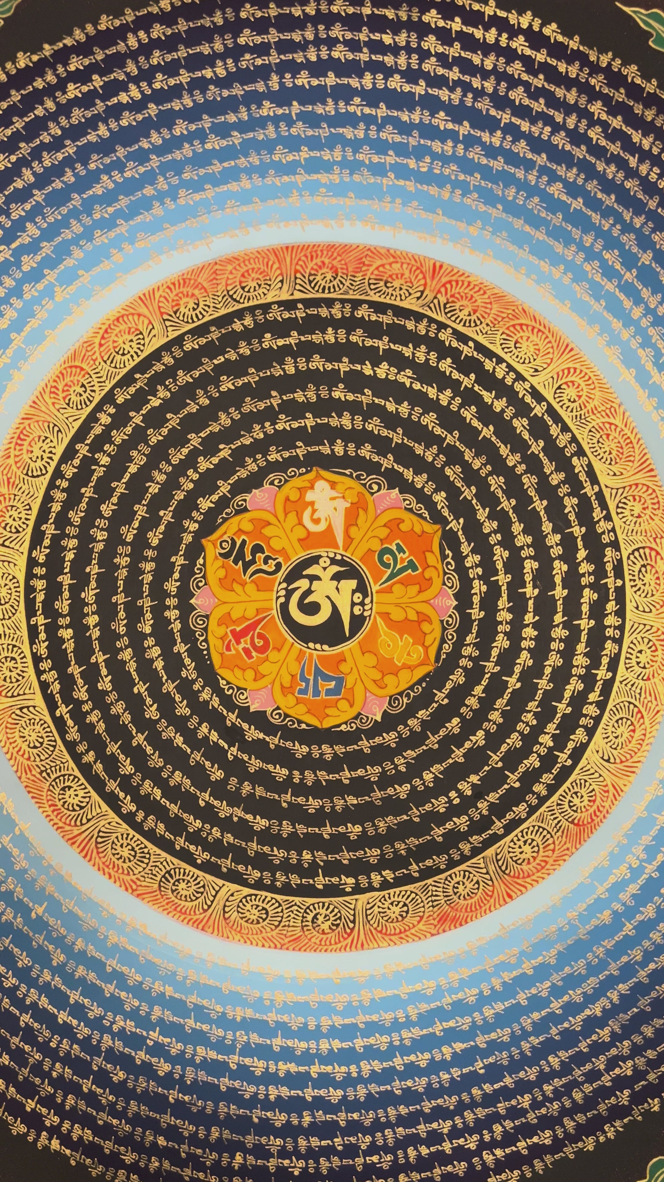 Hand-painted Mantra Mandala Thangka with concentric golden Tibetan mantra script, central seed syllable, and traditional auspicious symbols in the corners.