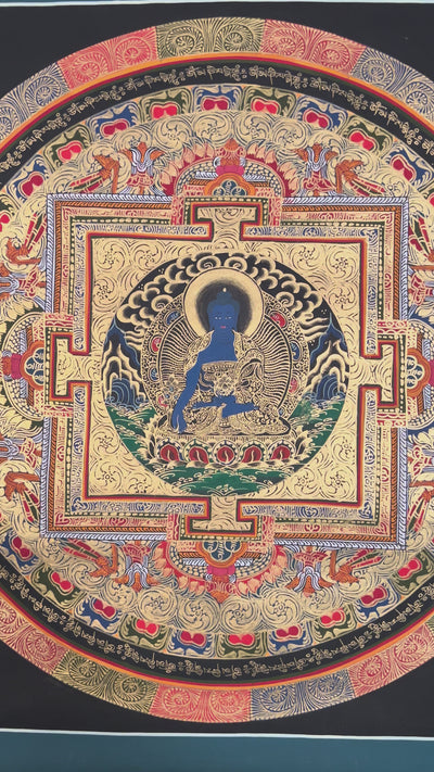 Hand painted Medicine Buddha Mandala thangka depicting blue healing Buddha seated within sacred geometric palace on dark background