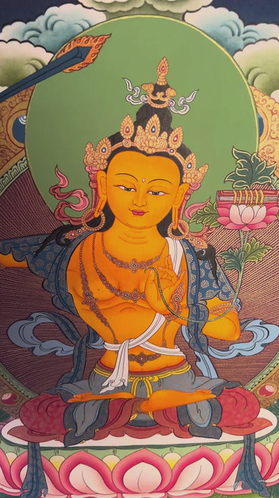 Hand painted Manjushree Thangka painting depicting the Buddhist deity of wisdom seated on a lotus throne in traditional Nepalese art