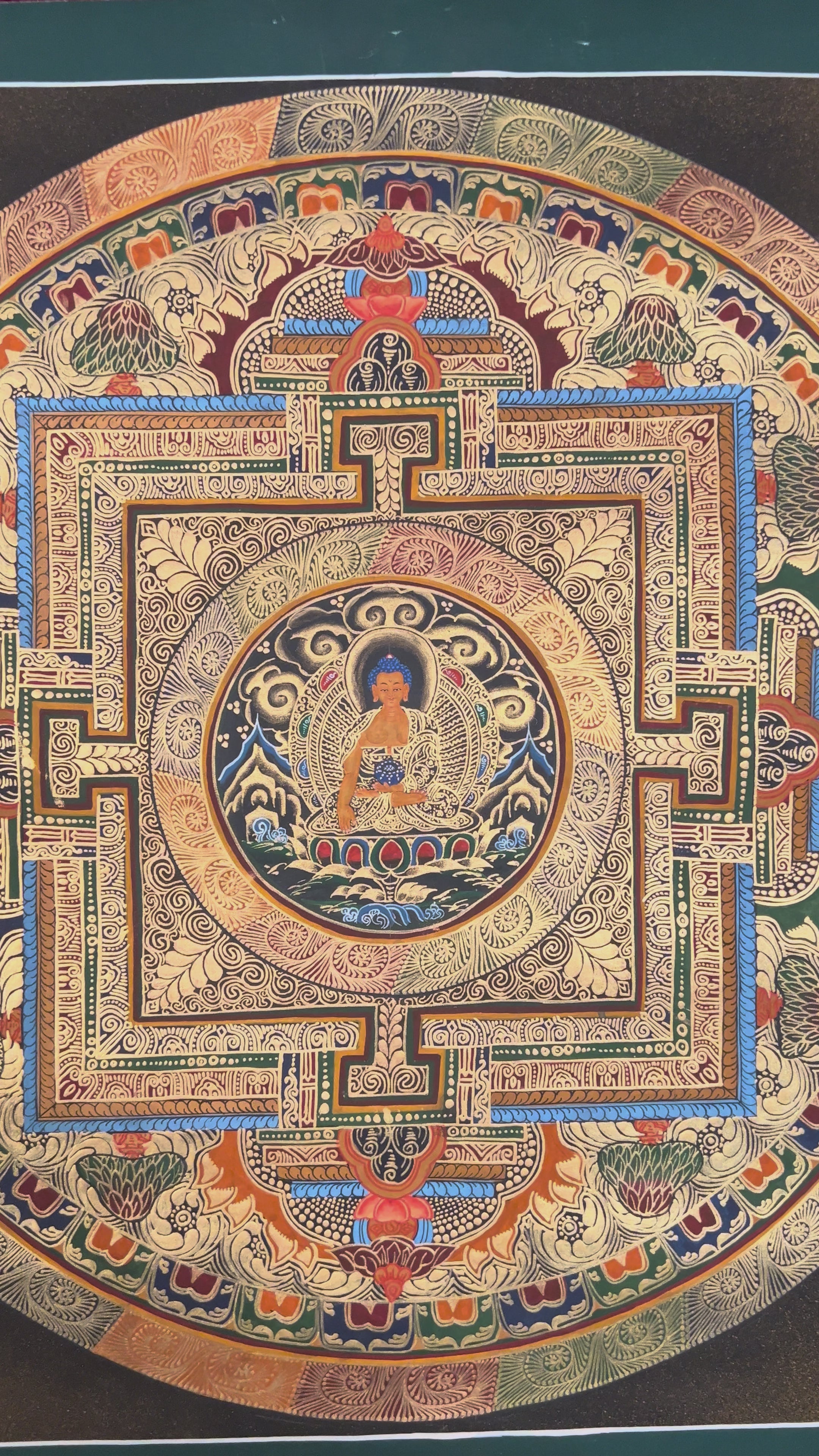 Hand painted Shakyamuni Buddha Mandala thangka depicting the Buddha seated within sacred geometric palace on dark background