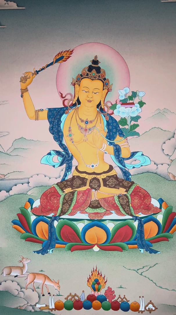 Manjushree thangka featuring the Bodhisattva of Wisdom holding a flaming sword and sacred lotus scripture seated on a lotus throne