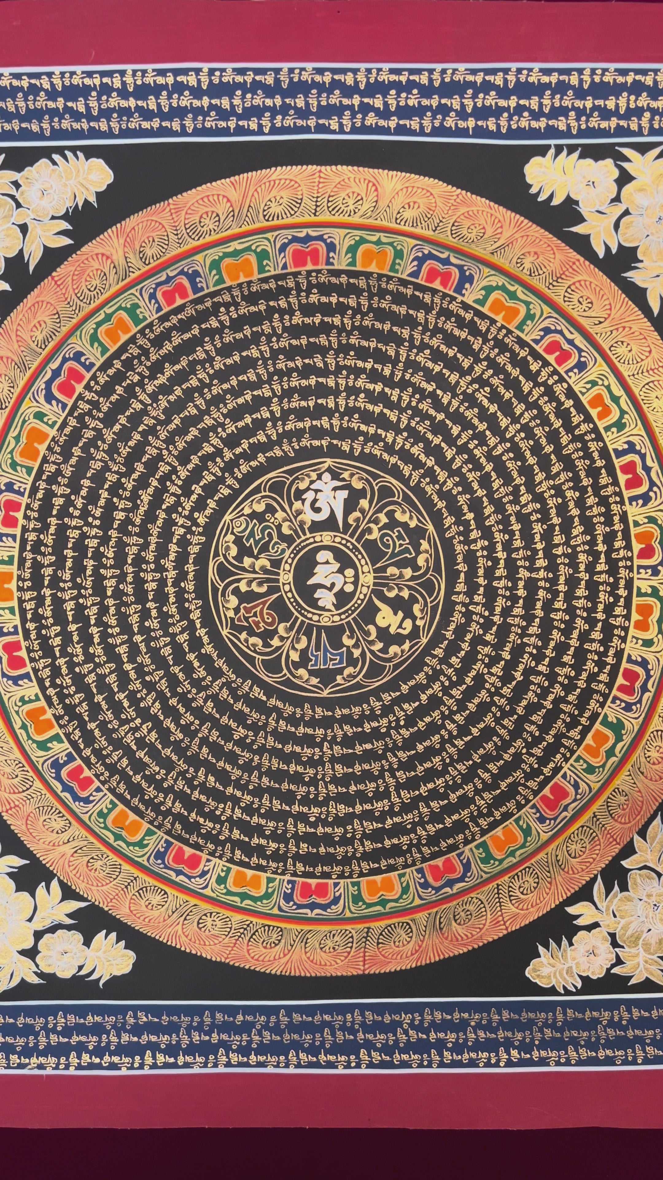 Golden Tibetan mantra mandala with full script border on black background.