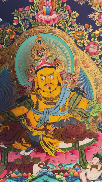 Hand painted Zambala Thangka painting depicting the Buddhist deity of prosperity with a mongoose and offerings in traditional Nepalese Buddhist art