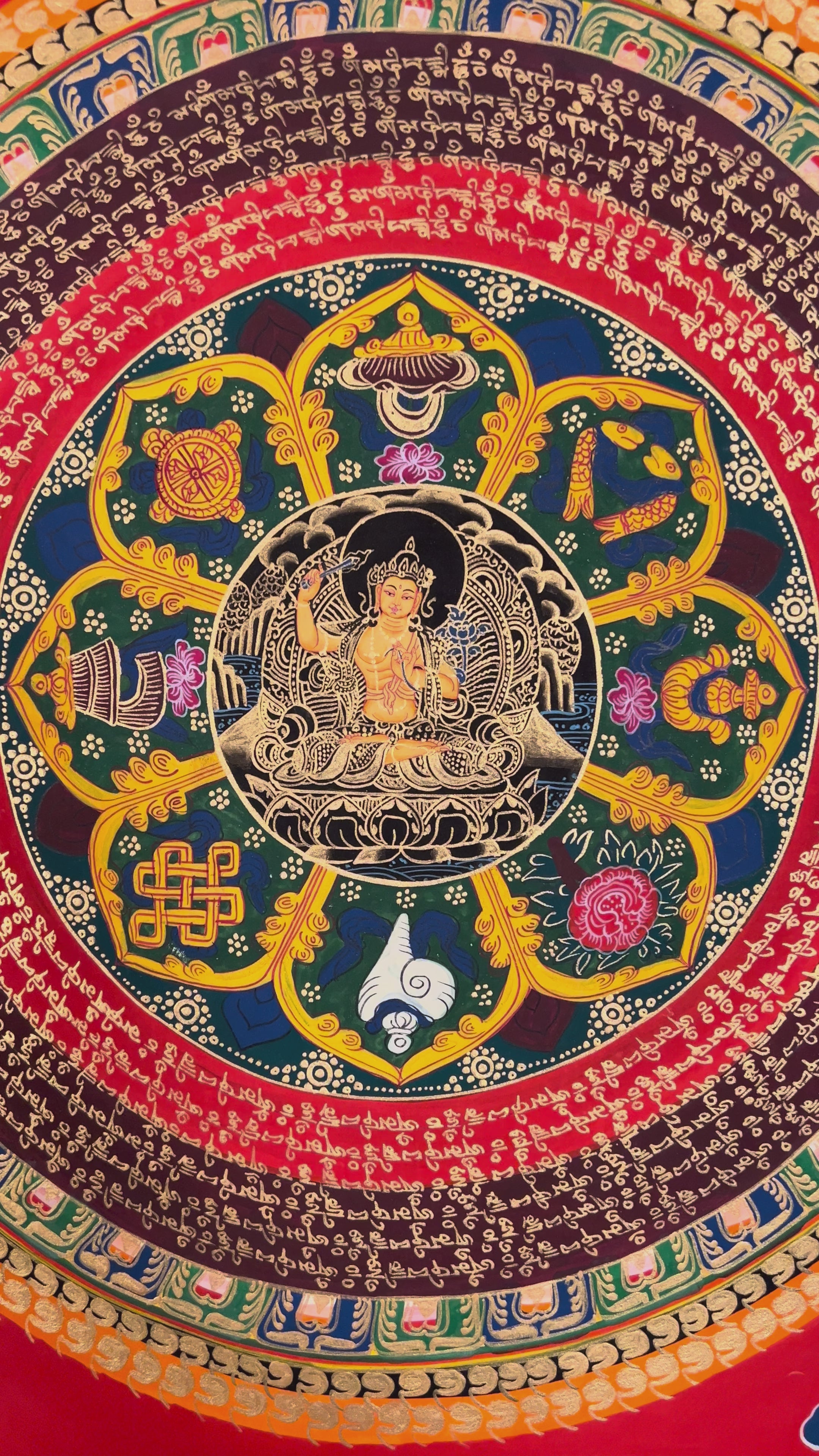 Hand painted Manjushree Mandala thangka depicting Tibetan Bodhisattva of Wisdom surrounded by mantra rings on red background