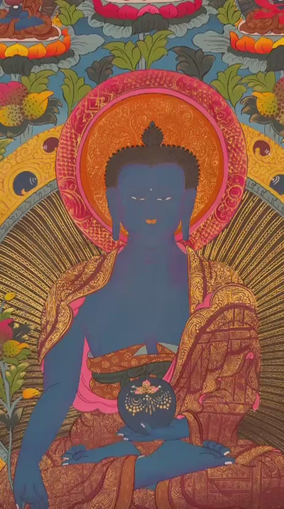 Hand-painted Medicine Buddha thangka featuring the Tibetan Buddha of Healing seated on a lotus throne with sacred gold detailing and vibrant Himalayan symbolism