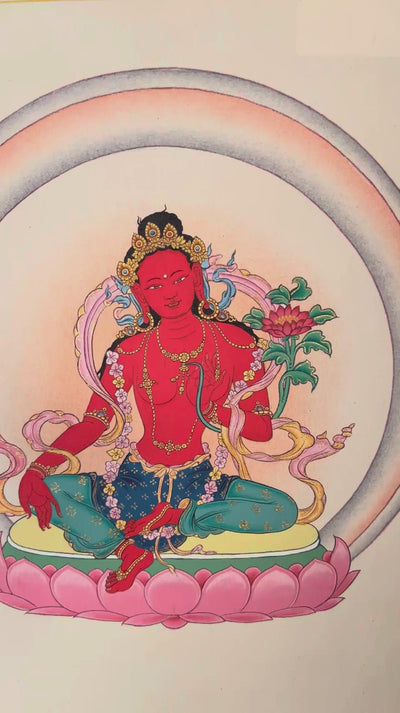 Red Tara Tibetan Buddhist thangka featuring red goddess seated on pink lotus throne holding lotus flower