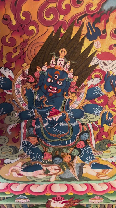 Mahakala Thangka painting depicting the blue Buddhist protector surrounded by sacred flames, lotus details and Himalayan landscape in traditional Tibetan Buddhist art from Nepal
