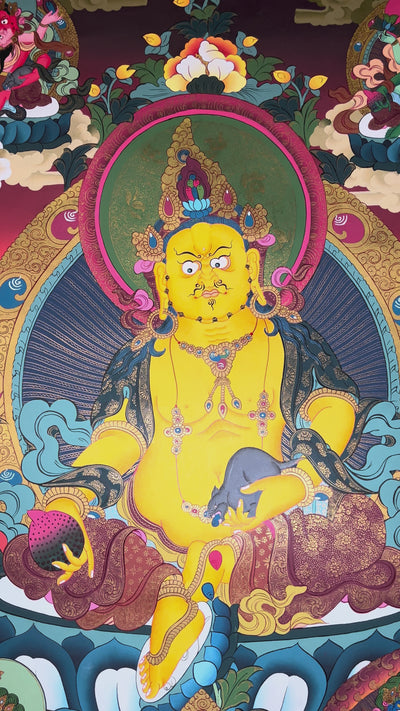 Colorful Yellow Zambhala thangka depicting the Buddhist wealth deity holding a mongoose and jewel vase.