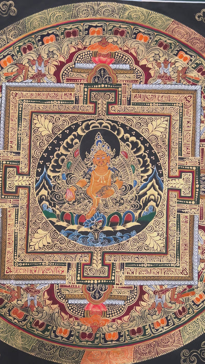 Hand painted Zambhala Mandala thangka depicting Tibetan wealth deity seated within sacred geometric palace on black background