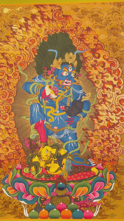 Black Zambhala thangka with flames, serpents, mongoose, and subdued figure.