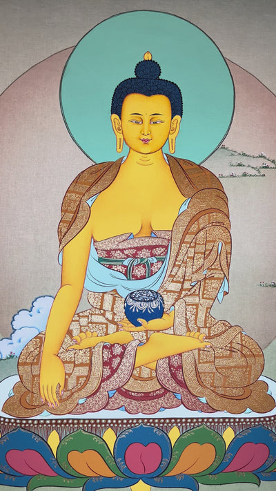 Shakyamuni Buddha thangka showing a golden Buddha seated on a lotus in earth-touching gesture holding an alms bowl with a calm background.
