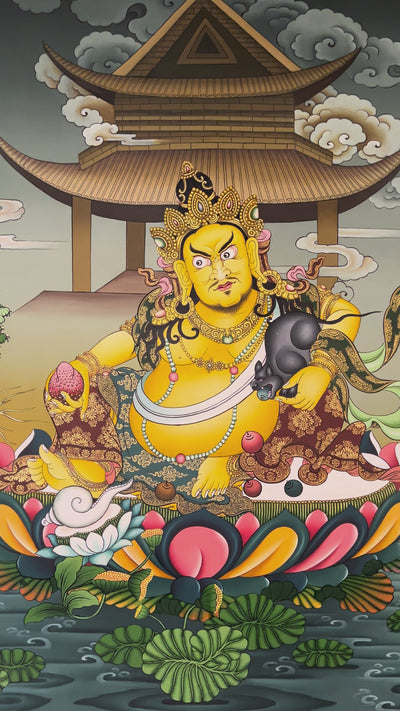 Hand-painted Yellow Dzambhala thangka showing Tibetan wealth deity seated on lotus throne above water holding mongoose and citron, with temple pavilion background and gold detailing.