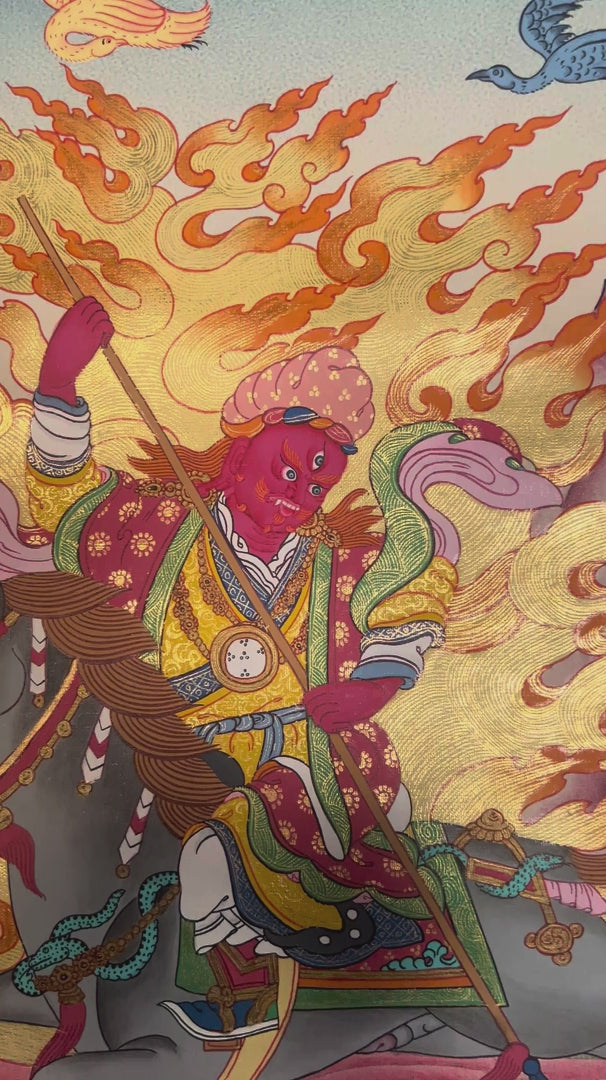 King Gesar Thangka depicting the legendary Tibetan warrior king riding a gray horse through wisdom flames beneath the blessings of Guru Rinpoche.