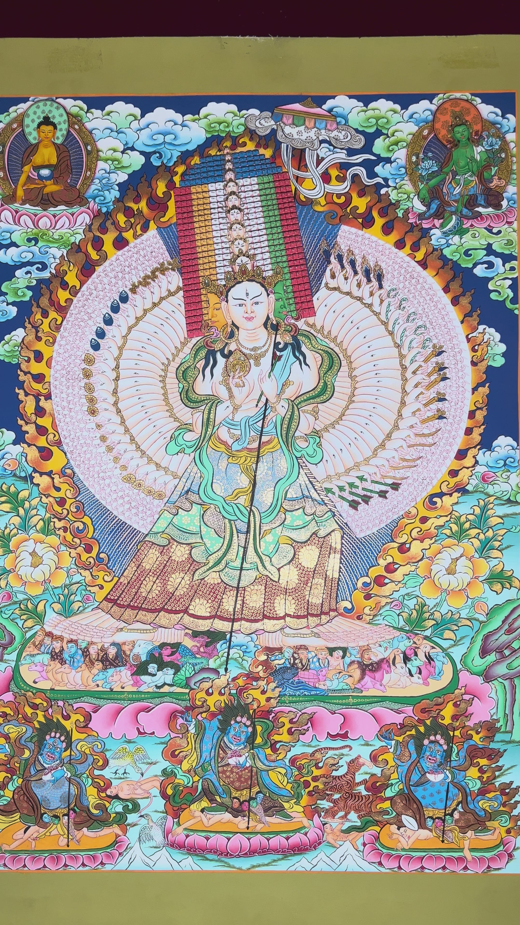 Hand-painted Dukkar thangka featuring the Tibetan Buddhist White Umbrella Goddess with multiple arms surrounded by sacred flames, celestial Buddhas, and protective symbolism