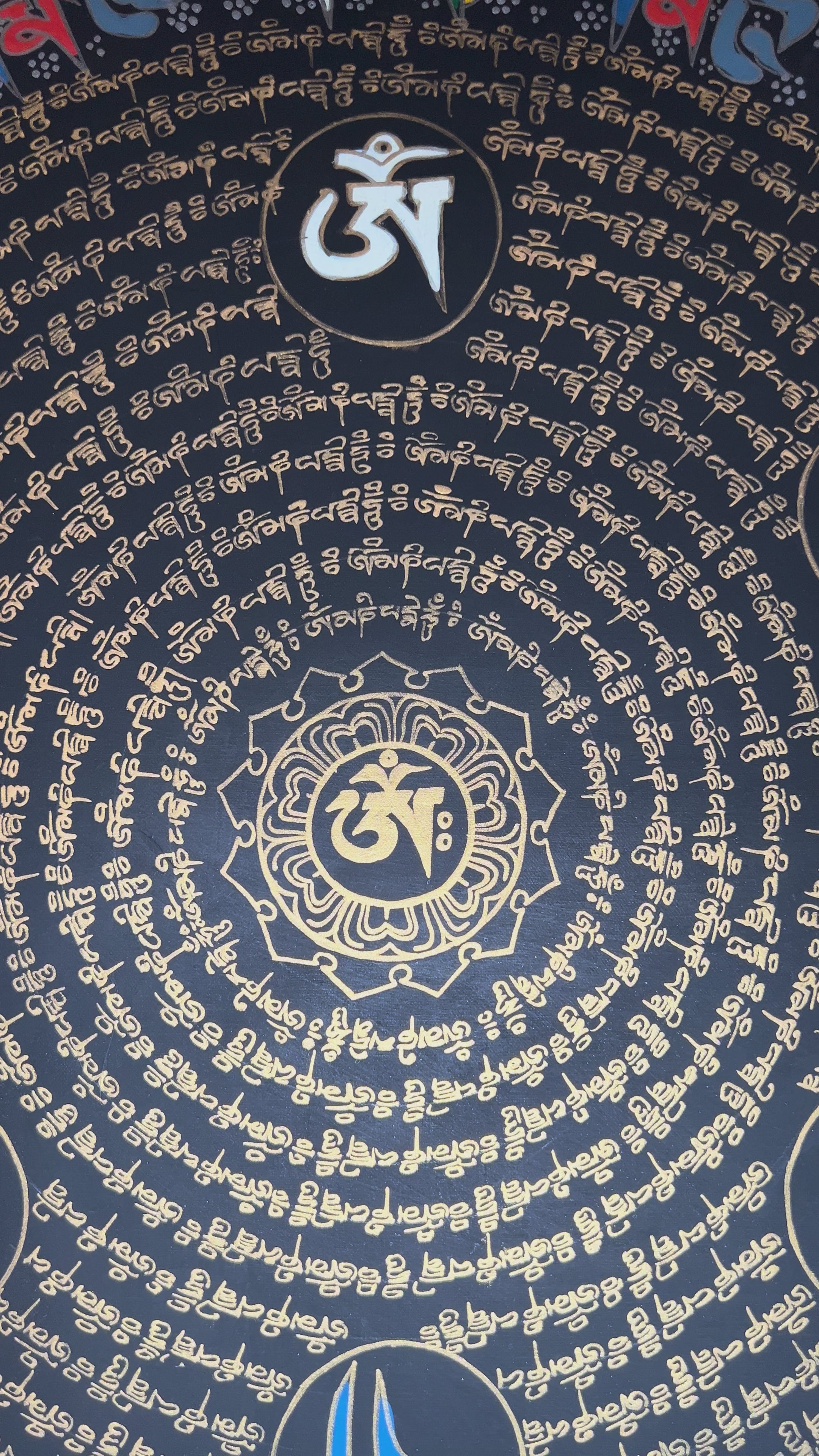 Black Tibetan mantra mandala thangka with concentric gold script circles and central sacred syllable representing meditation and sacred geometry.