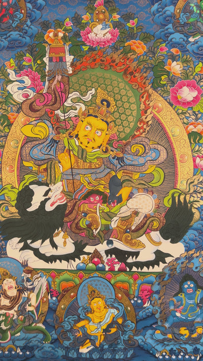 Hand-painted Singh Zambhala thangka with blue background, showing wealth deity riding snow lion and holding mongoose.