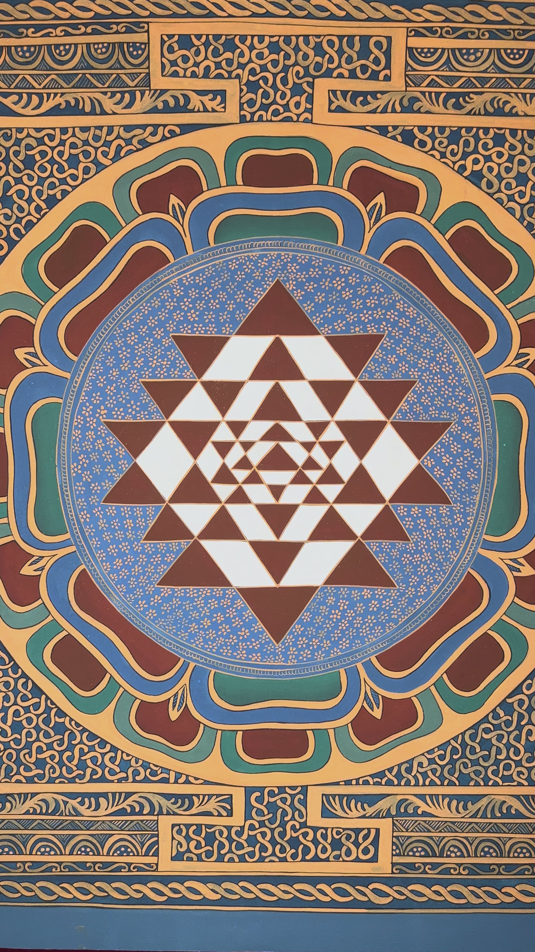 Hand-painted Shree Yantra lotus mandala featuring sacred geometric triangles within an ornate Tantric decorative border
