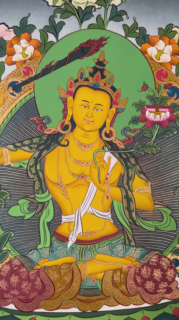 Tibetan Manjushree thangka featuring the Bodhisattva of Wisdom holding a flaming sword and lotus with Prajnaparamita scripture surrounded by Buddhist deities
