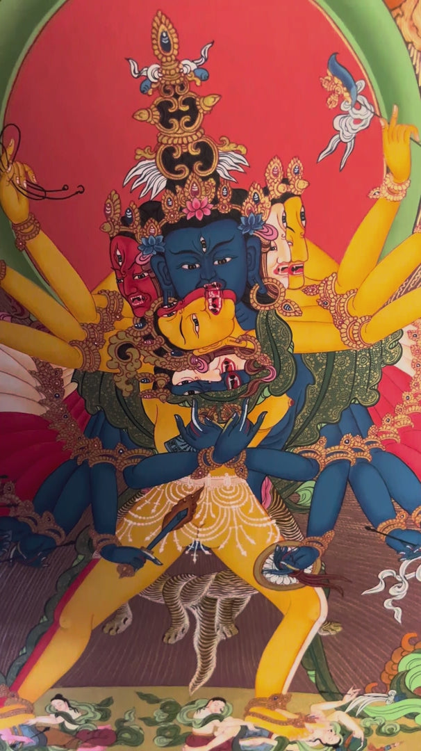 KalChakra Thangka painting depicting the KalChakra deity with sacred flames, lotus base, Himalayan landscape and traditional Tibetan Buddhist artwork from Nepal